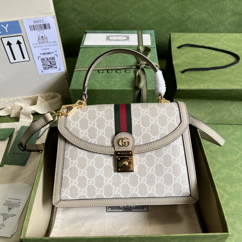 G*u*i top handle bags